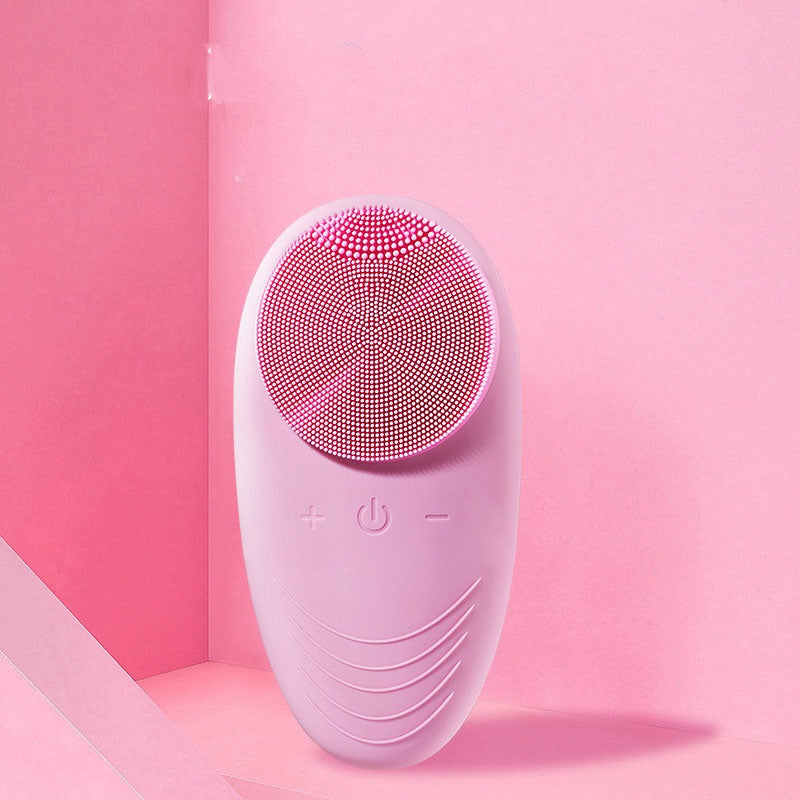 Mini electric facial cleansing brush with silicone soft bristles in multiple colors, compact and portable design